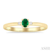 4x3 MM Oval Shape Emerald and 1/50 Ctw Petite Round Cut Diamond Fashion Ring in 10K Yellow Gold